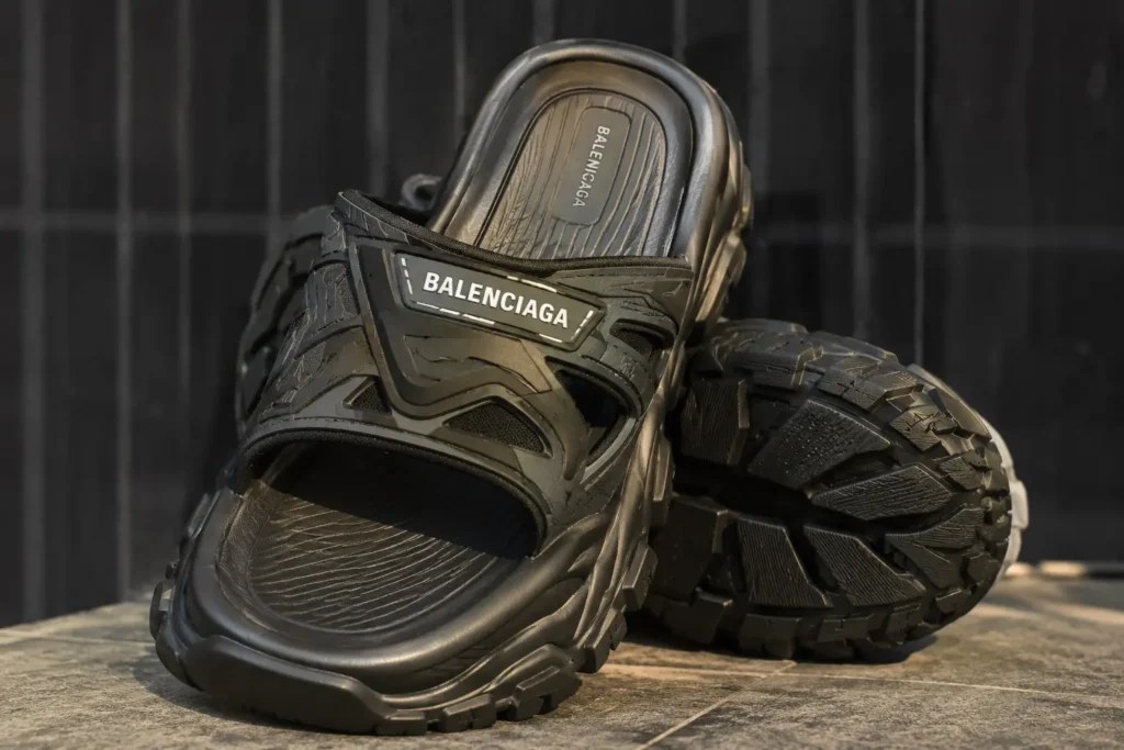 Rugged Black Luxury Slides Close-Up